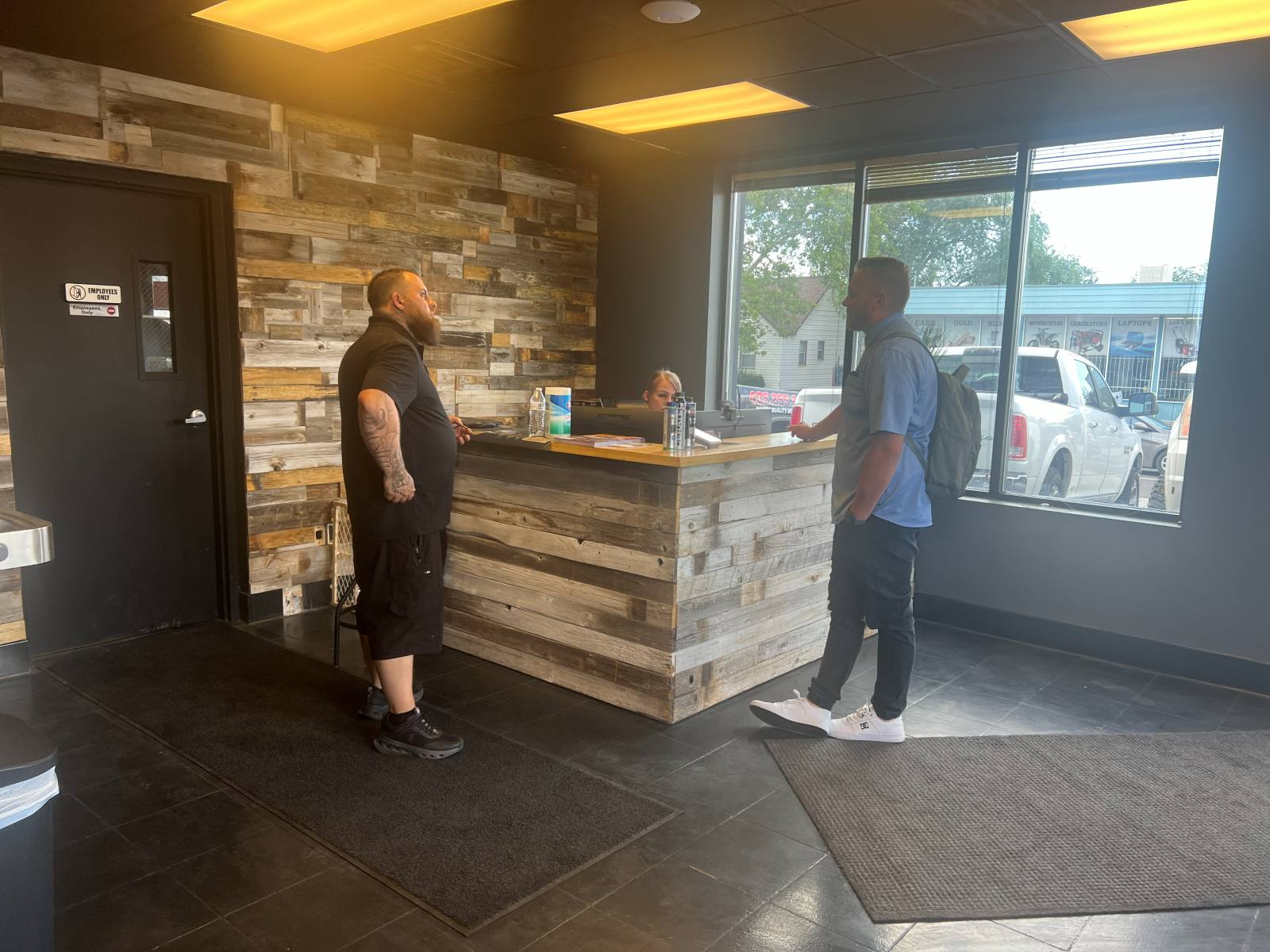 Customer at the front desk at Awesome Auto Repair